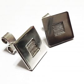 Aros de plata de 950 con hilos del mismo metal tejidos en telar. Rocío